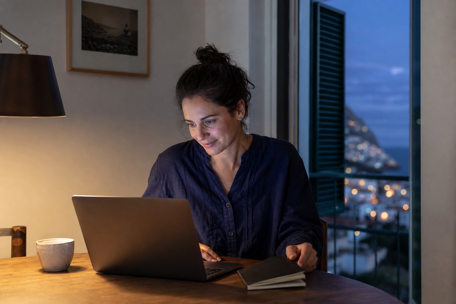 A creator seeing her first product work late at night in Funchal