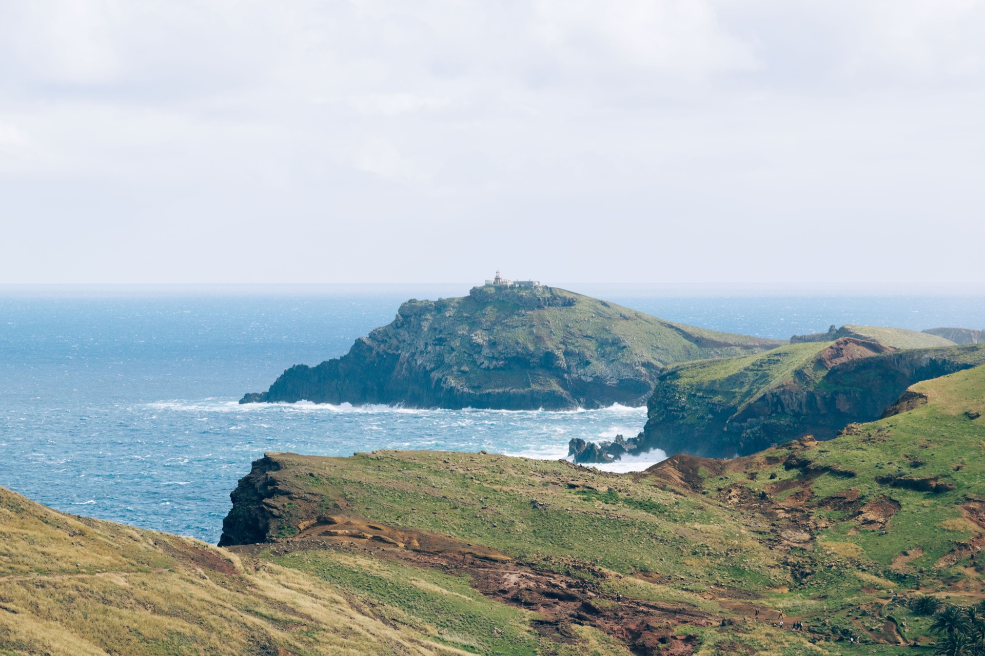 The real volcanic coastline of Madeira meeting the Atlantic